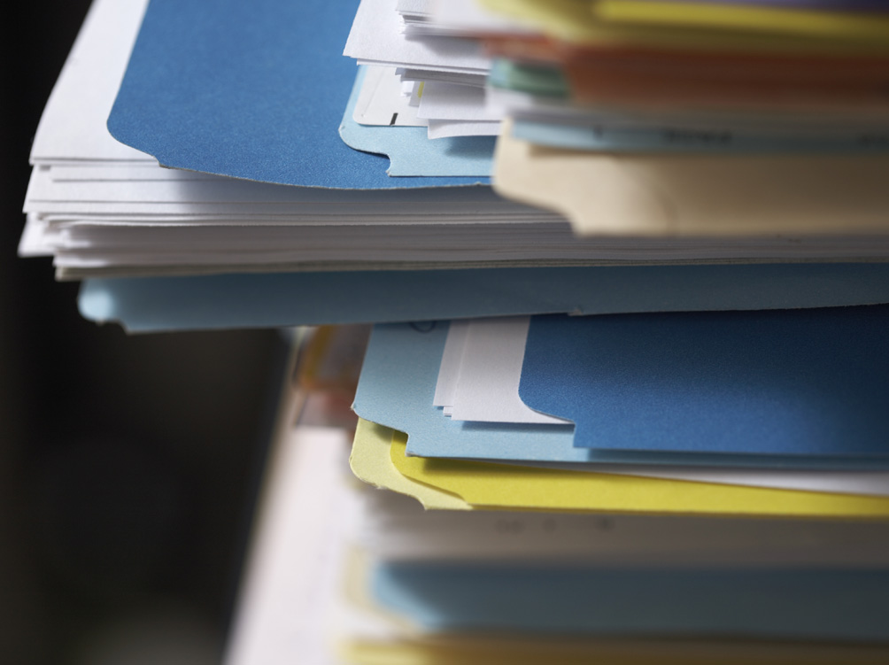 Corner of stack of files, close-up